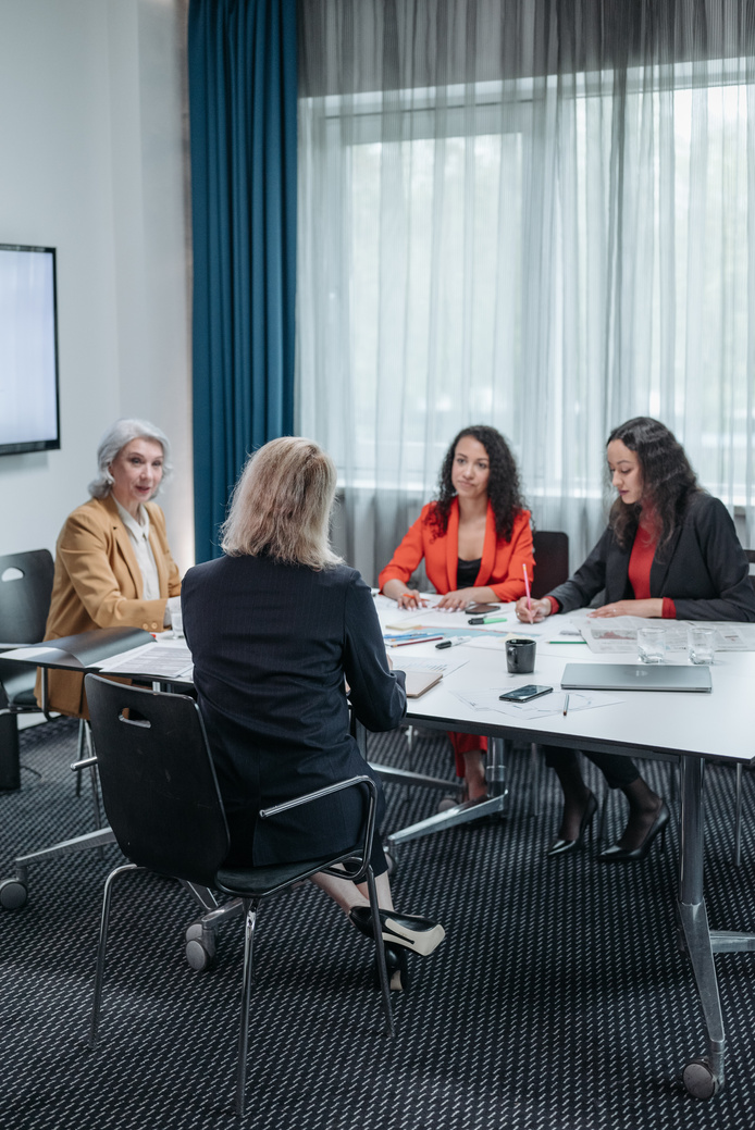 Business Women Having a Meeting Inside the Office